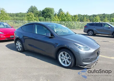 2023 Tesla Model Y z USA, uszkodzony, nr VIN 7SAYGDEE9PF829917